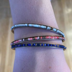 Three multi-color bead bracelets